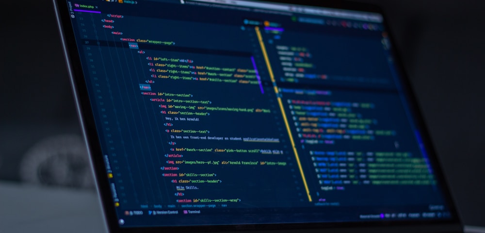 Close-up of code on a dark screen showing smart contract logic