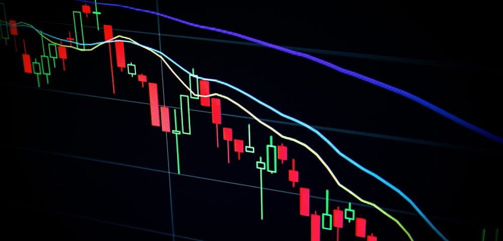 Cryptocurrency exchange trading screens showing volatile market data